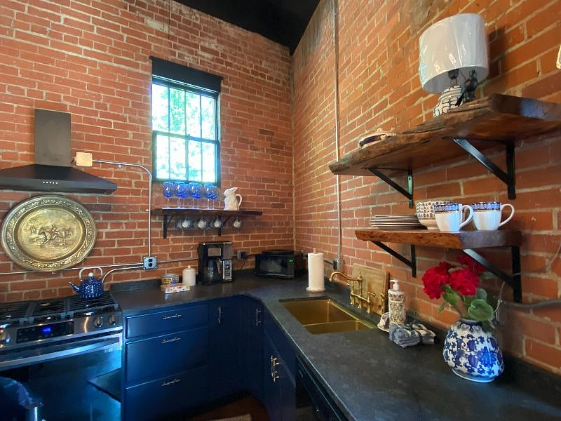 The Brit kitchen with granite countertops.