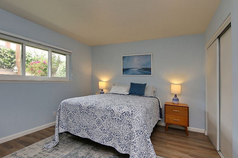 Guest Bedroom 1 - Queen Bed with Dresser & Large Closet & 2 Nightstands.