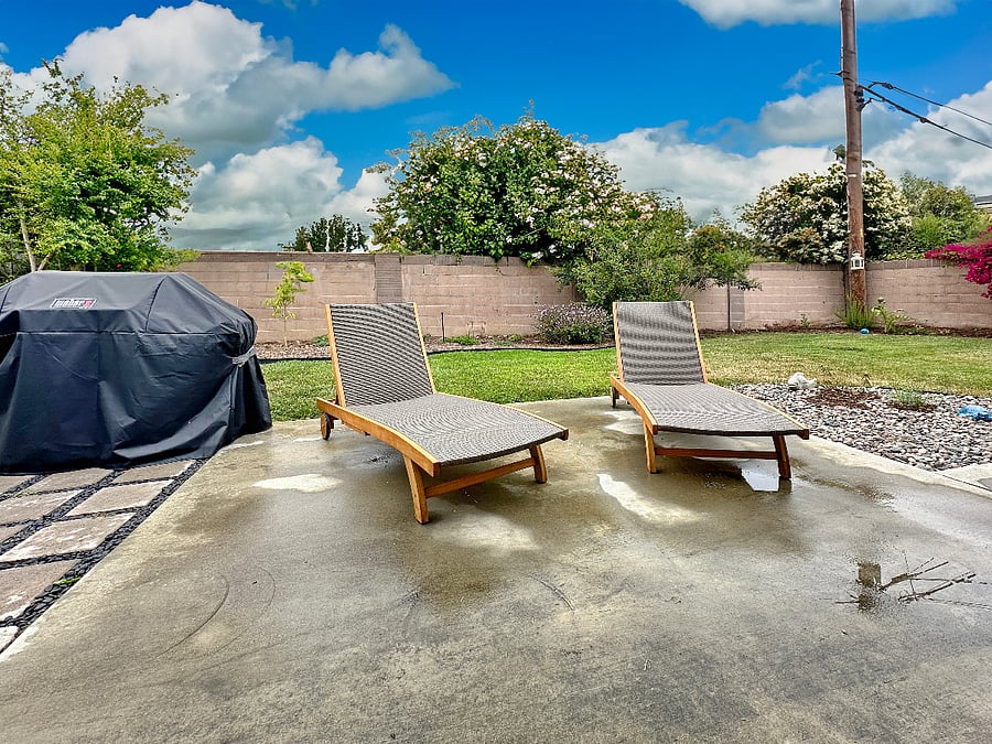 Backyard Patio with 2 Loungers.
