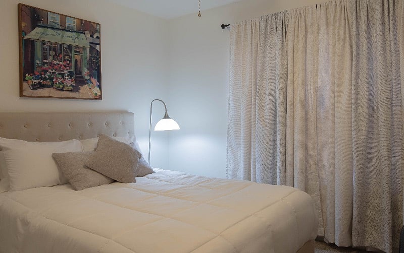 Front bedroom with large widows over looking the MTSU campus.  Removable blackout curtains installed.