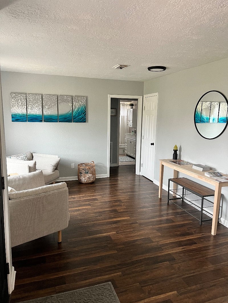 Hallway to 3 rooms and gym