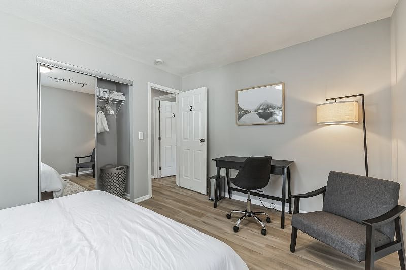 Room 2 is a large and bright room with a Queen-sized bed, closet with organizers for all your things. Desk and chair for your work if needed, accent chair, floor lamp for your relax and unwindings!