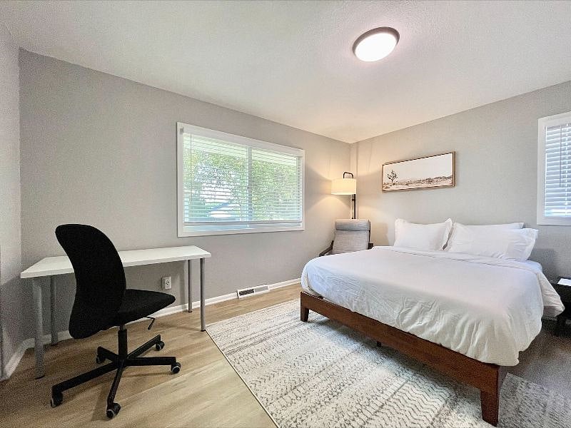 A desk and comfortable chairs for your work while staying, unwinding.