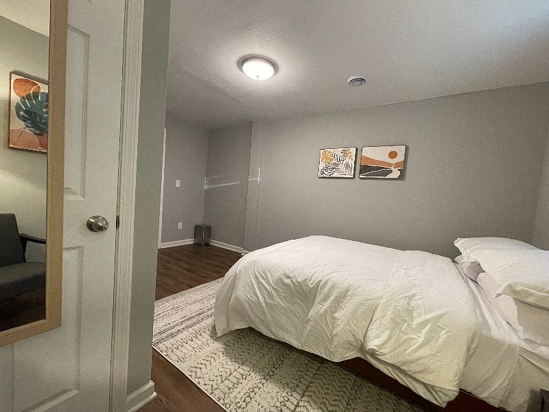 Room 5 is a large and bright room with a Queen-sized bed, closet with organizers for all your things. Large window with faux wood blinds for sleeping! USB Wall Charger Power Strip, Multi Plug Outlet.