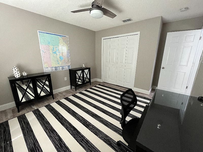 Office has two storage cabinets and large closet