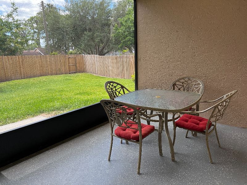Lanai is fully screened with seating for four