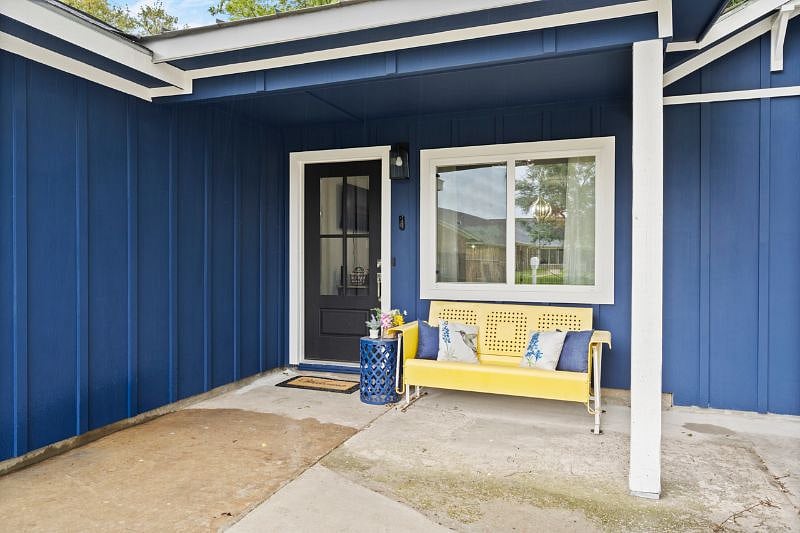 At the front porch you can relax on the glider swing and listen to the birds sing.