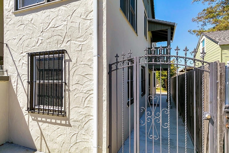 Gated secured lower unit entrance.
