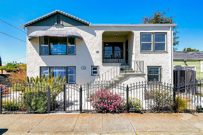 Clean, well maintained house with landscaping.