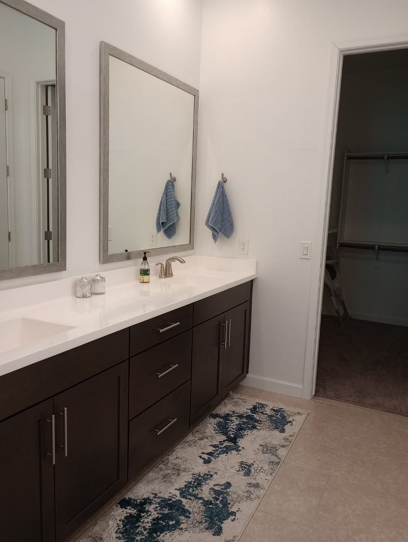 Dual sinks in Master with large nearby closet