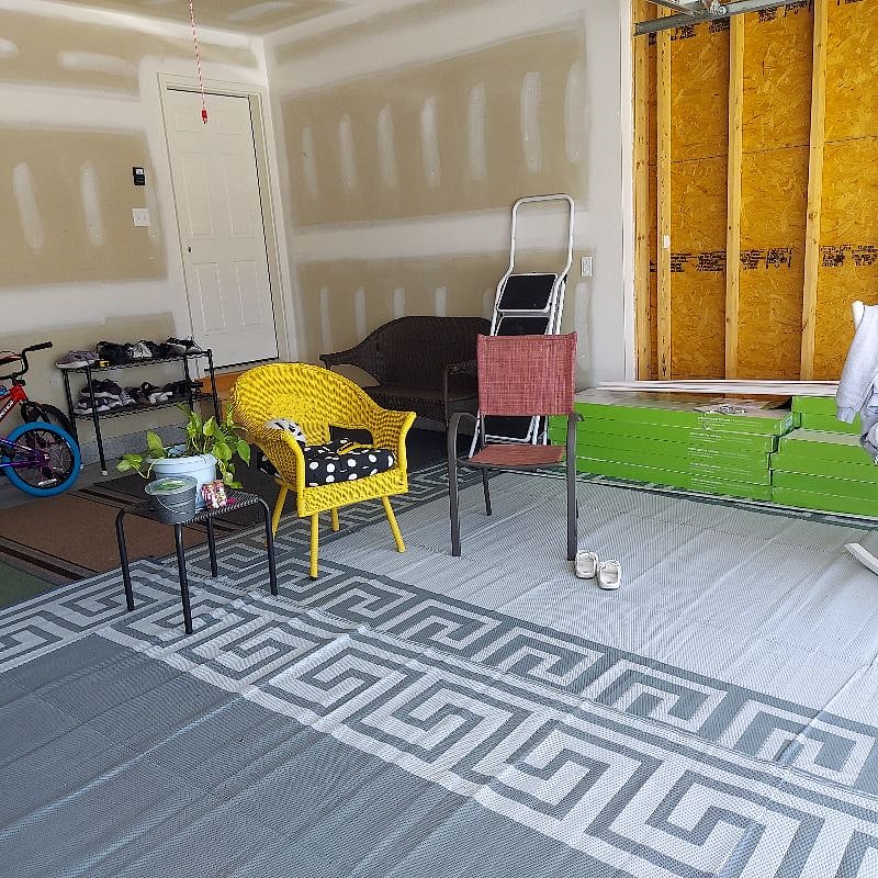 garage being used as a sitting area