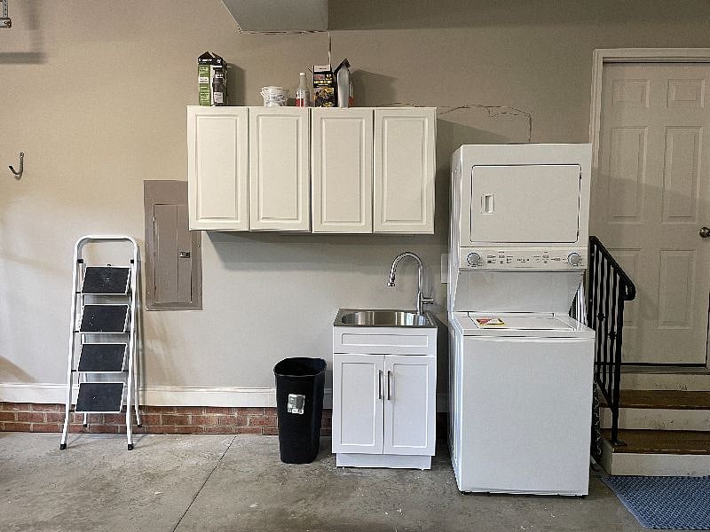 Washer and dryer only for apartment use. Drying rack and ironing board located here for use. 