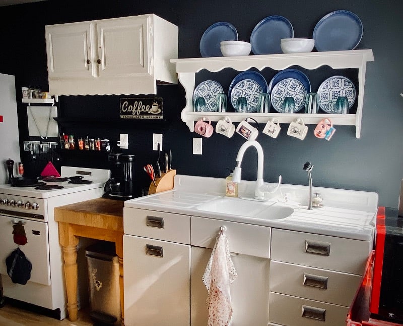Well stocked kitchen with large refrigerator.