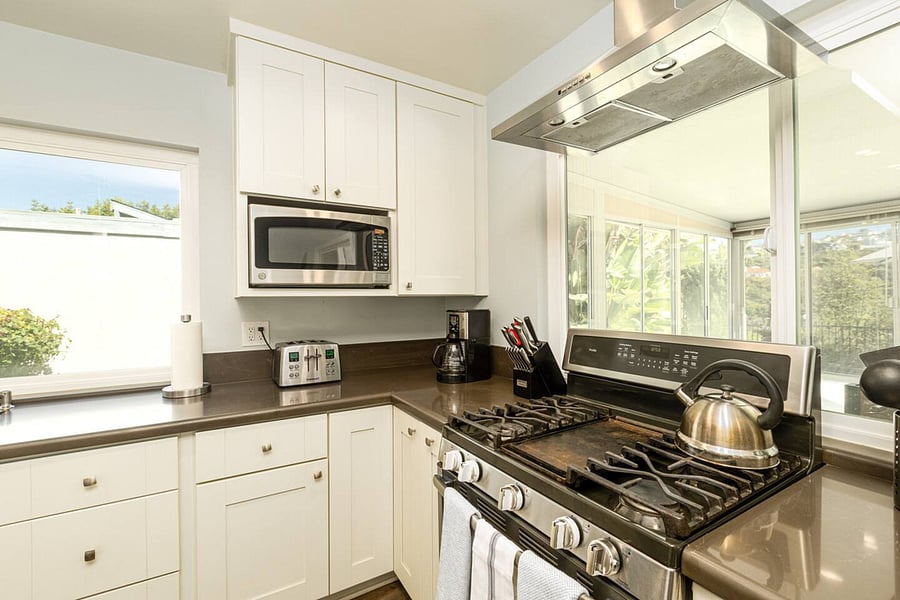 Gourmet Kitchen with top of the line appliances and cooking utensils