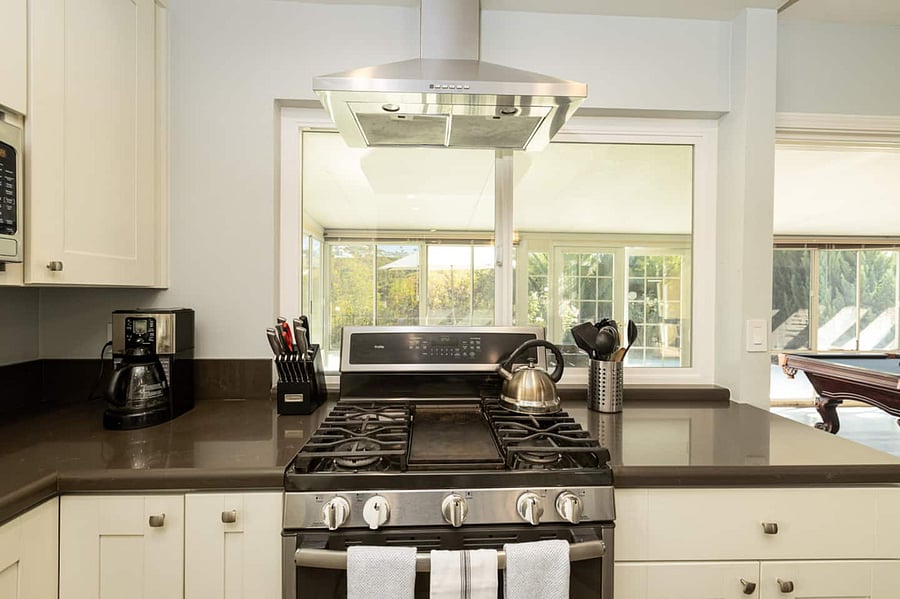 Gourmet Kitchen with top of the line appliances and cooking utensils