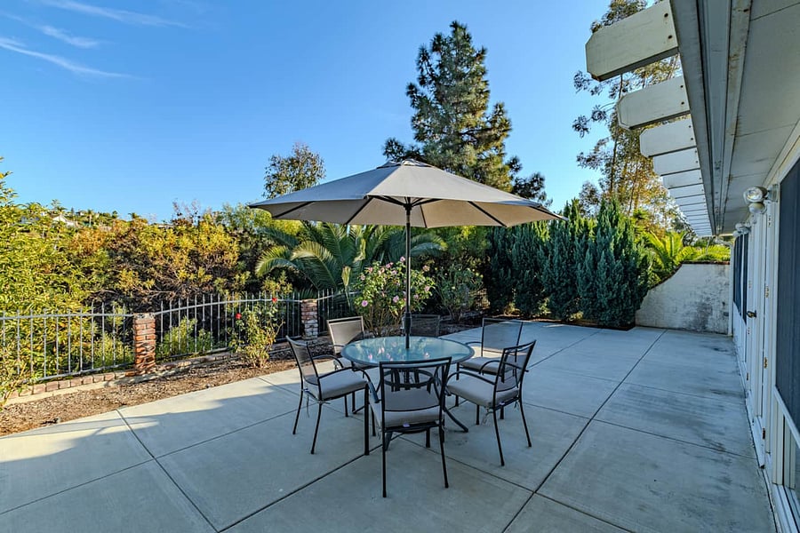 Enjoy this gorgeous backyard & sitting area when home.