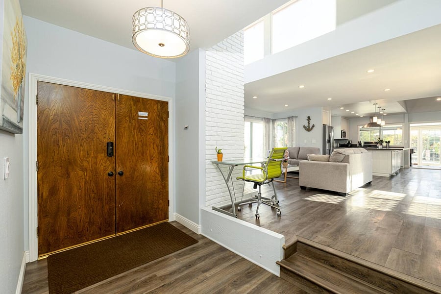 Enjoy the open floor plan and the dedicated workstation to work from home.