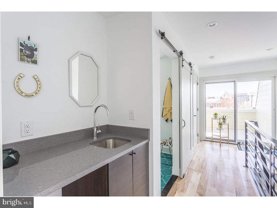 Third-floor wet bar (view from bedroom towards bathroom)