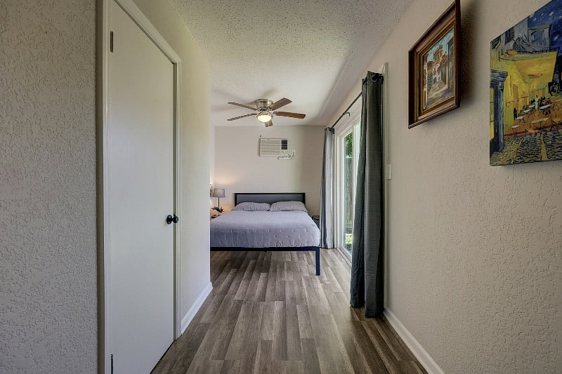 Very comfortable queen bed with blackout curtains and box fan if desired. 