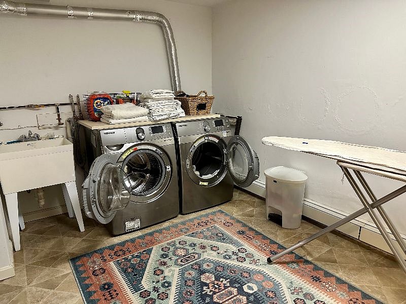 Full size laundry and dryer, iron and board. Full size fridge as well.