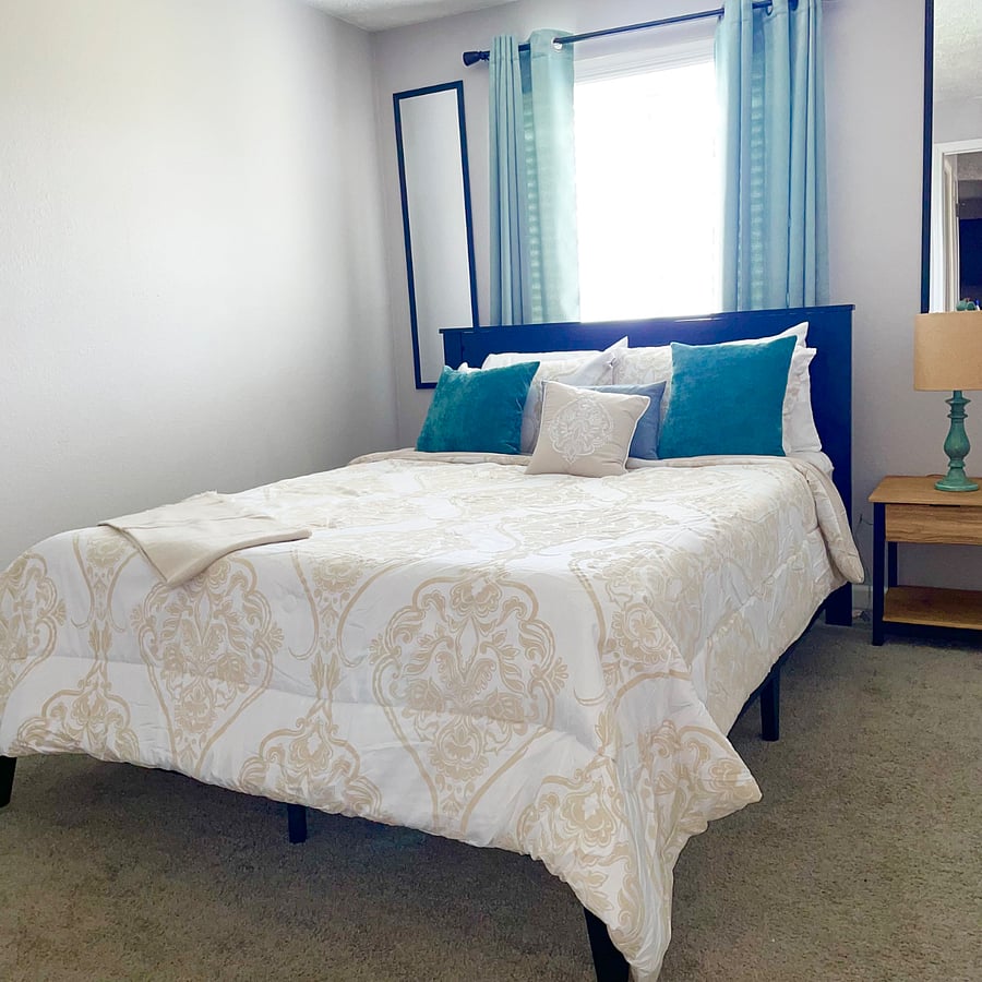 Queen bed in bedroom 1