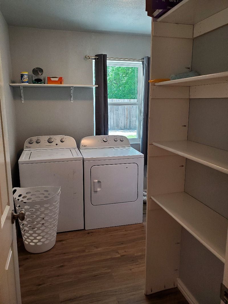 Separate utility room with shelving