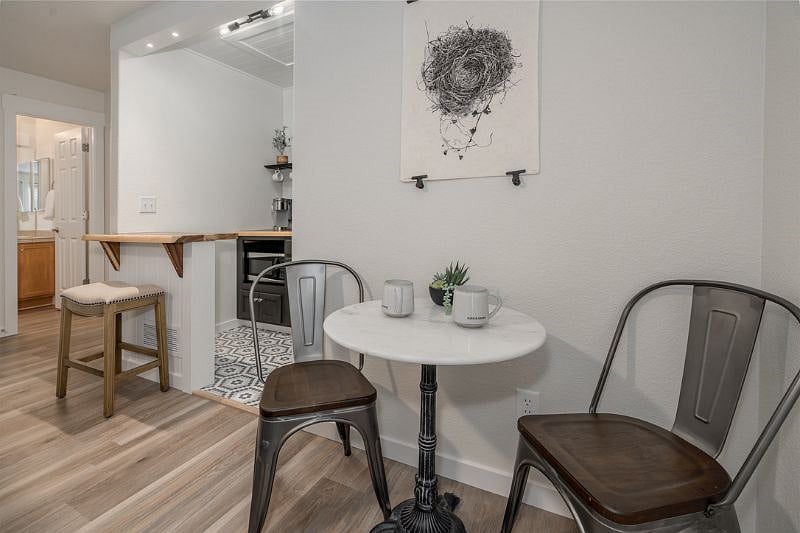  Intimate bistro vibes await you! Our charming dining area, perfect for one or two. 