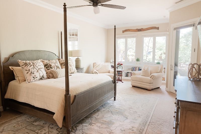 Master bedroom with reading nook and large flat screen TV