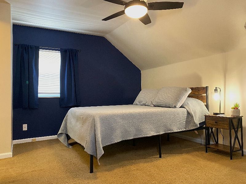 Bedroom with blackout curtains.
