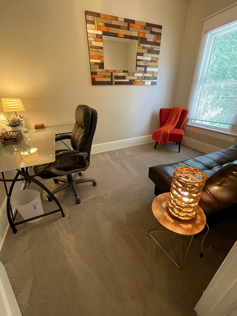 Office space with a sofa/futon. Two desks and a desk chair provide options for office use or private space for reading or phone calls. High speed internet is included!