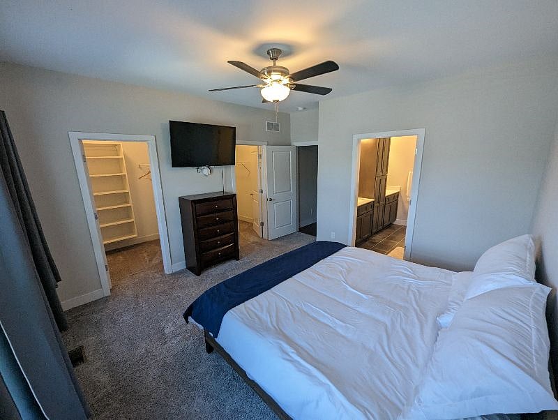 Master bedroom with 2 large walk-in closets