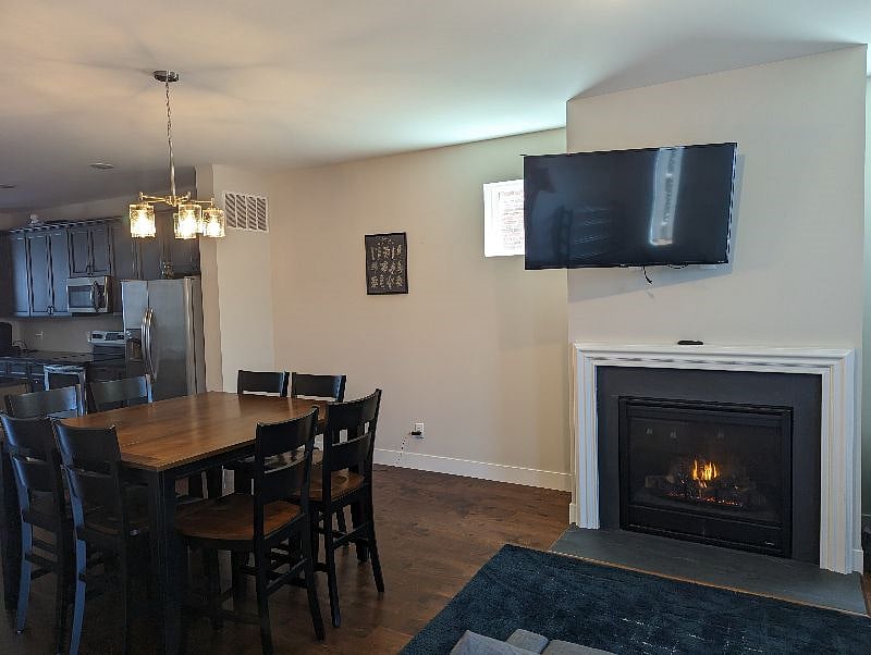Second living room, TV and fireplace