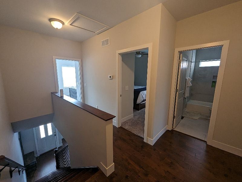 Second floor hallway; 2 bedrooms, 1 bathroom