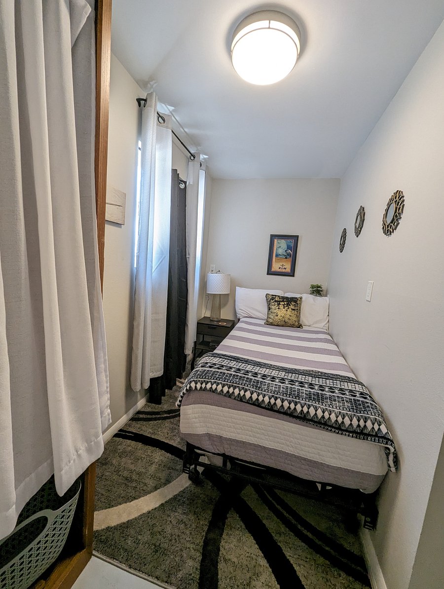 2nd Bedroom is Small. Big enough for a Extra Long Twin bed, Night Stand Armoire Closet and chest of drawers.
