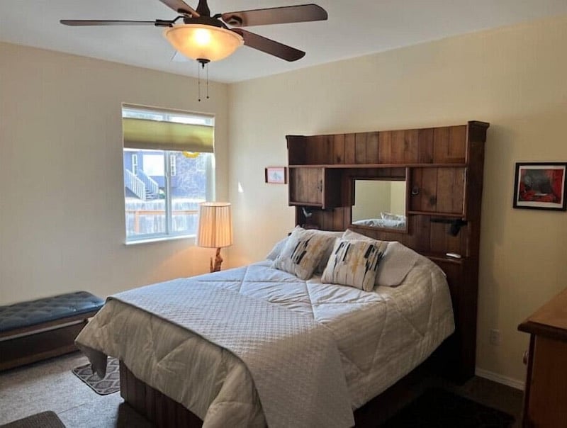 Master bedroom with queen bed, walk-in closet and private bathroom
