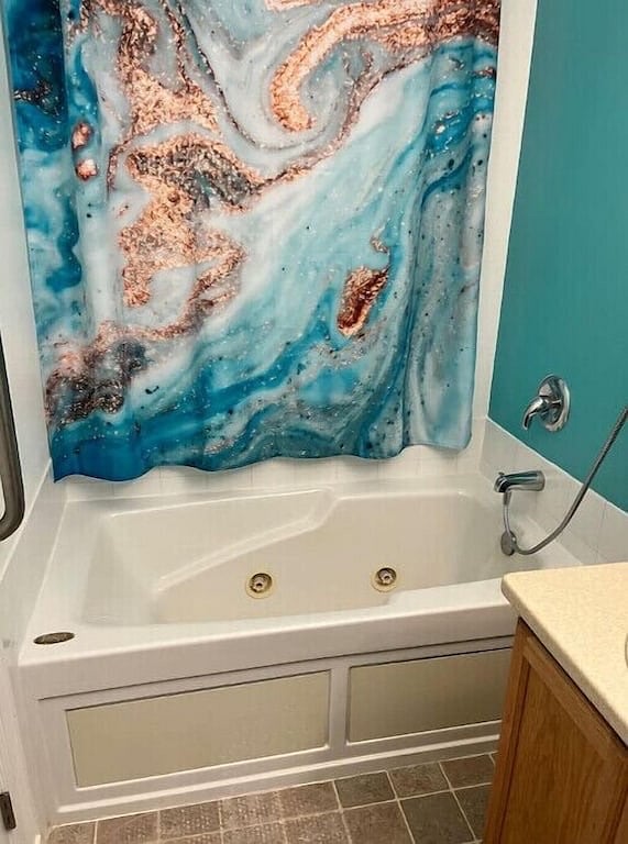 Master bathroom with jetted Jacuzzi tub and walk-in shower