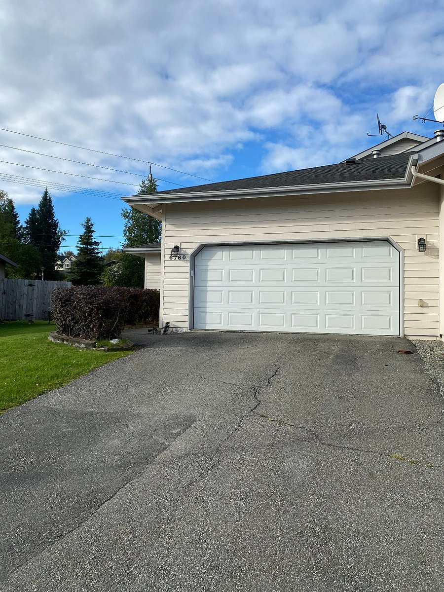 Cul-de-sac street view.  Two car garage and large driveway for ample parking
