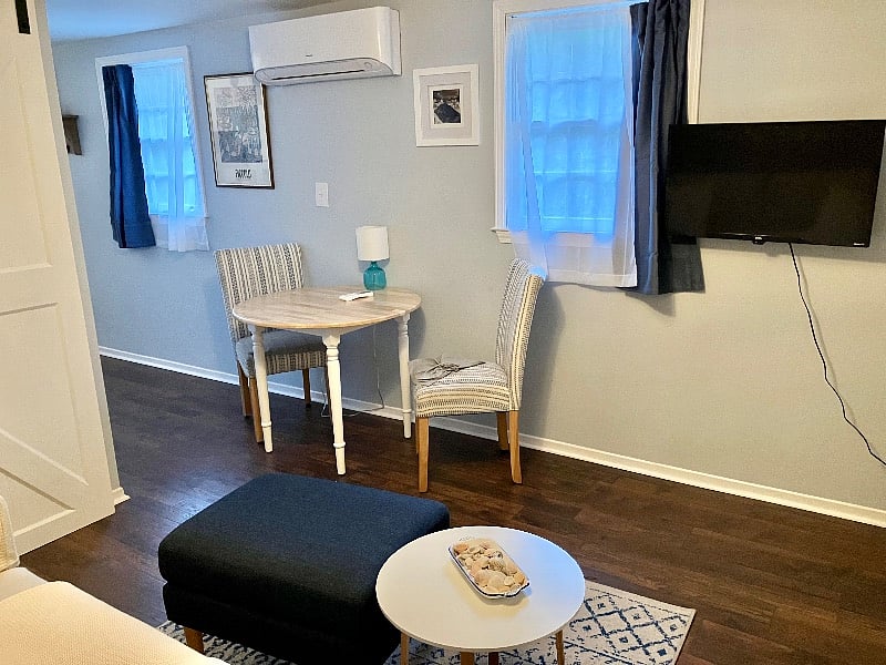 Another view; dining table and smart TV