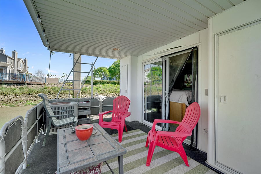 Private back porch off of primary bedroom