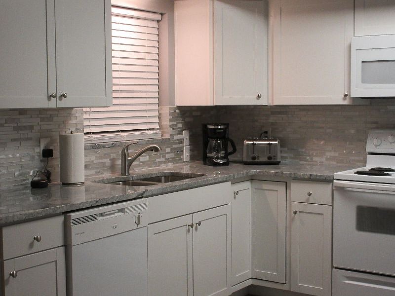 Granite Counters, fully functional kitchen with all cookware and place setting for six. 
