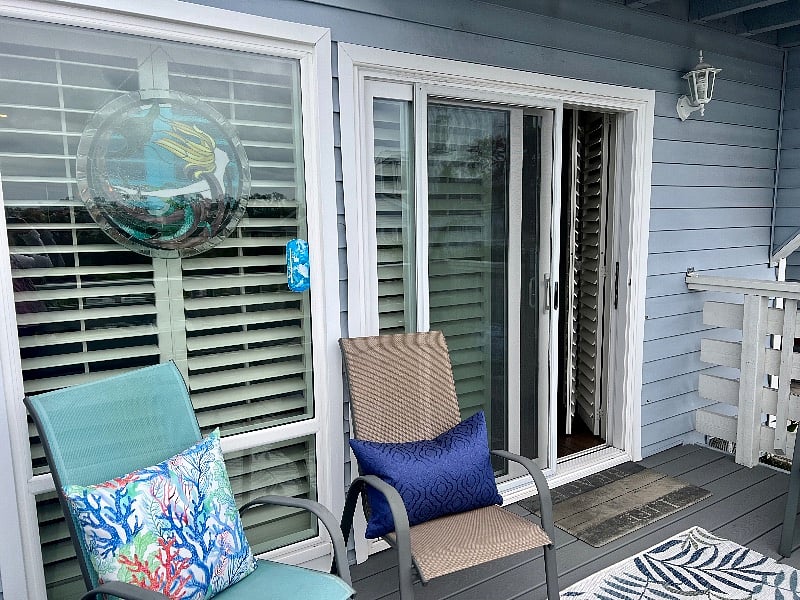 New outdoor cushions and area rug on the front balcony