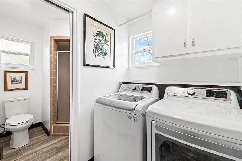 Second bathroom next to utility room with washer & dryer