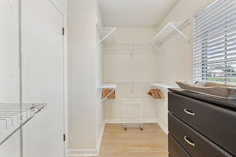 Extra Large walk in closet plenty of room on the right side and left. Left side shown In picture.