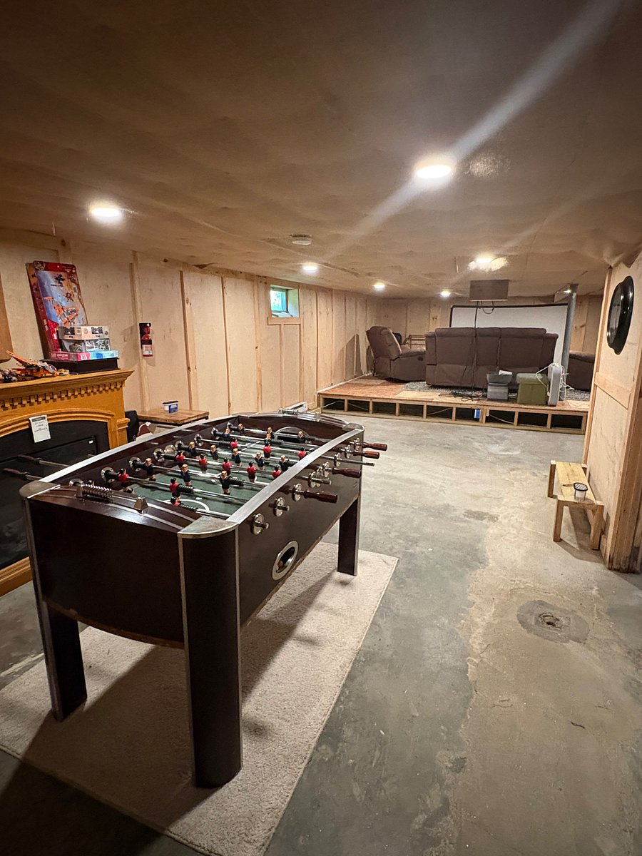 Heated Game room in basement, laundry room and spare bedroom.