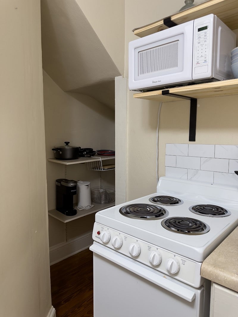 We have provided small appliances: Kuerig Coffee Machine, electric water kettle & microwave.