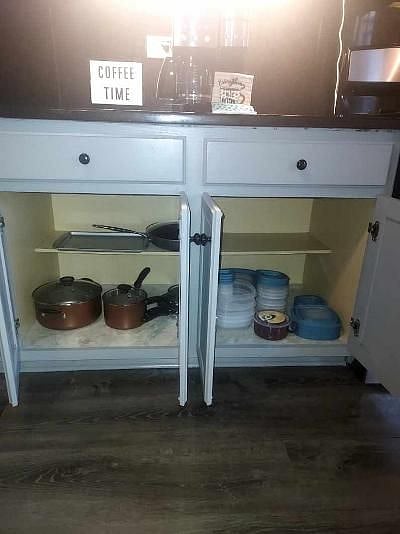 Lower drawer featuring pots and pans.
