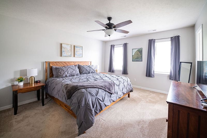 Primary Bedroom:
-King Size 14" Green Tea Cooling Gel Memory Foam Hybrid mattress, large walk-in closet, smart tv, blackout curtains, ceiling fan and large ensuite with vanity, walk-in shower and large soak tub. 