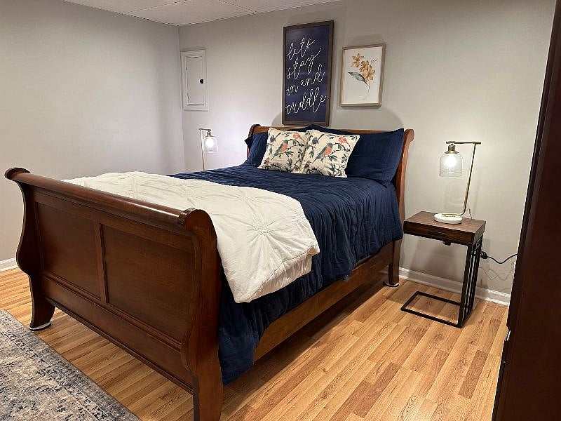 RIGHT ANGLE SIDE OFSLEIGH QUEEN-SIZE BED! MATCHING NIGHTSTANDS WITH ELECTRIC SERVICE, LIGHTS, AND USB PORTS FOR CELL PHONES, COMPUTERS, AND OTHER ITEMS THAT UTILIZE THOSE TYPES OF CHARGING STATIONS.