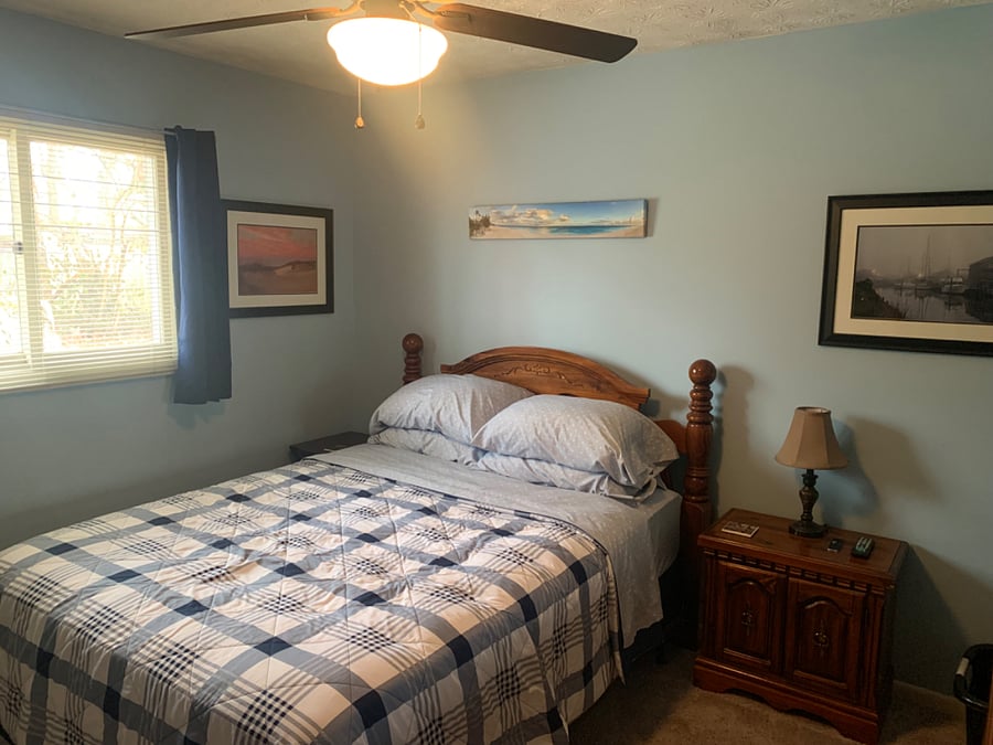 Guest room. Has a closet, dresser, chest of drawers, desk. Room has a key