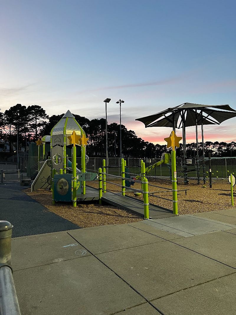 playground in the neighborhood at dusk
